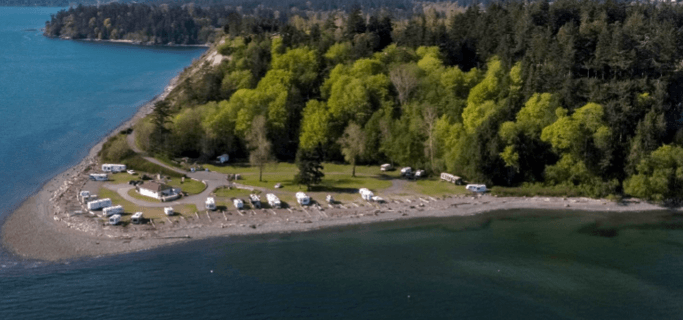 Aerial view of Beachcomber RV Park beside the Cowichan Head shoreline