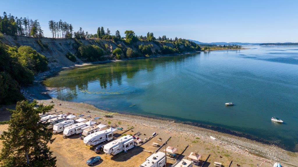 Waterfront RV sites along the bay at Beachcomber RV Park