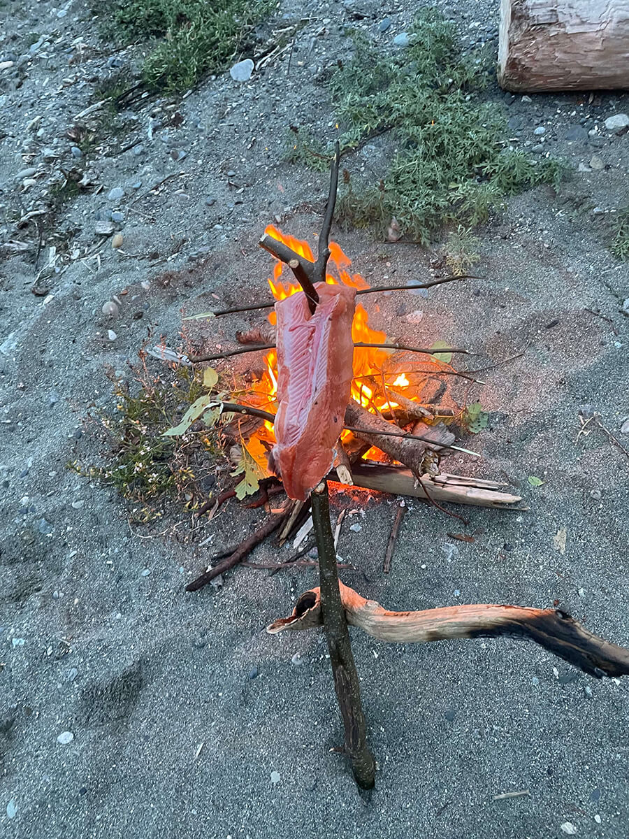 Small beach campfire on the sand at Beachcomber RV Park