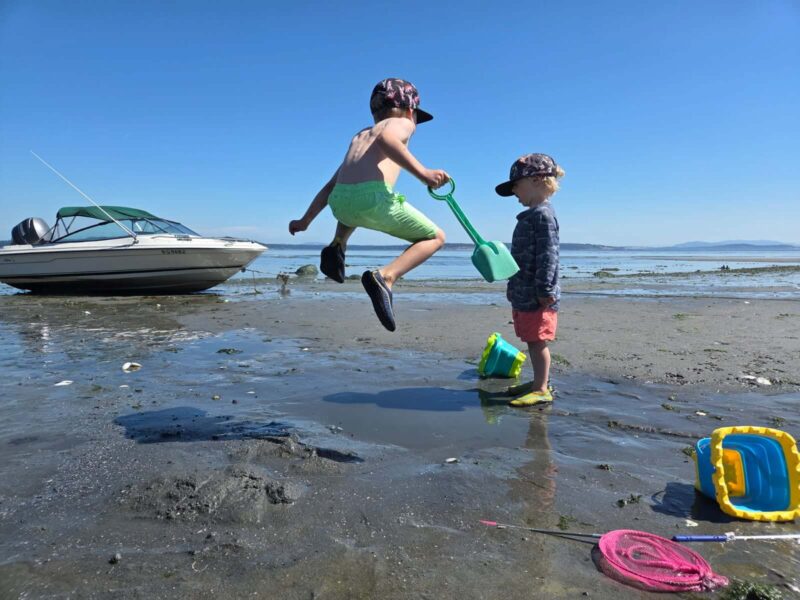 Children playing on the beach at Beachcomber RV Park